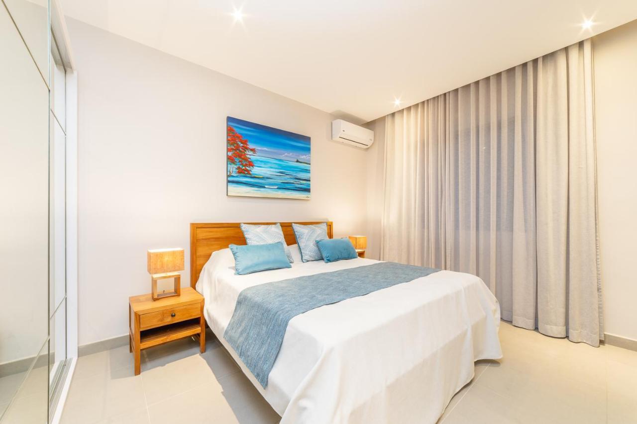 Penthouse 13 - One Bay Residence With Private Rooftop Terrace And Dip In Pool Pereybere Beach Extérieur photo