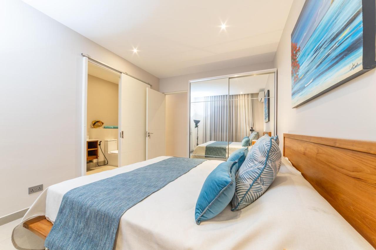 Penthouse 13 - One Bay Residence With Private Rooftop Terrace And Dip In Pool Pereybere Beach Extérieur photo